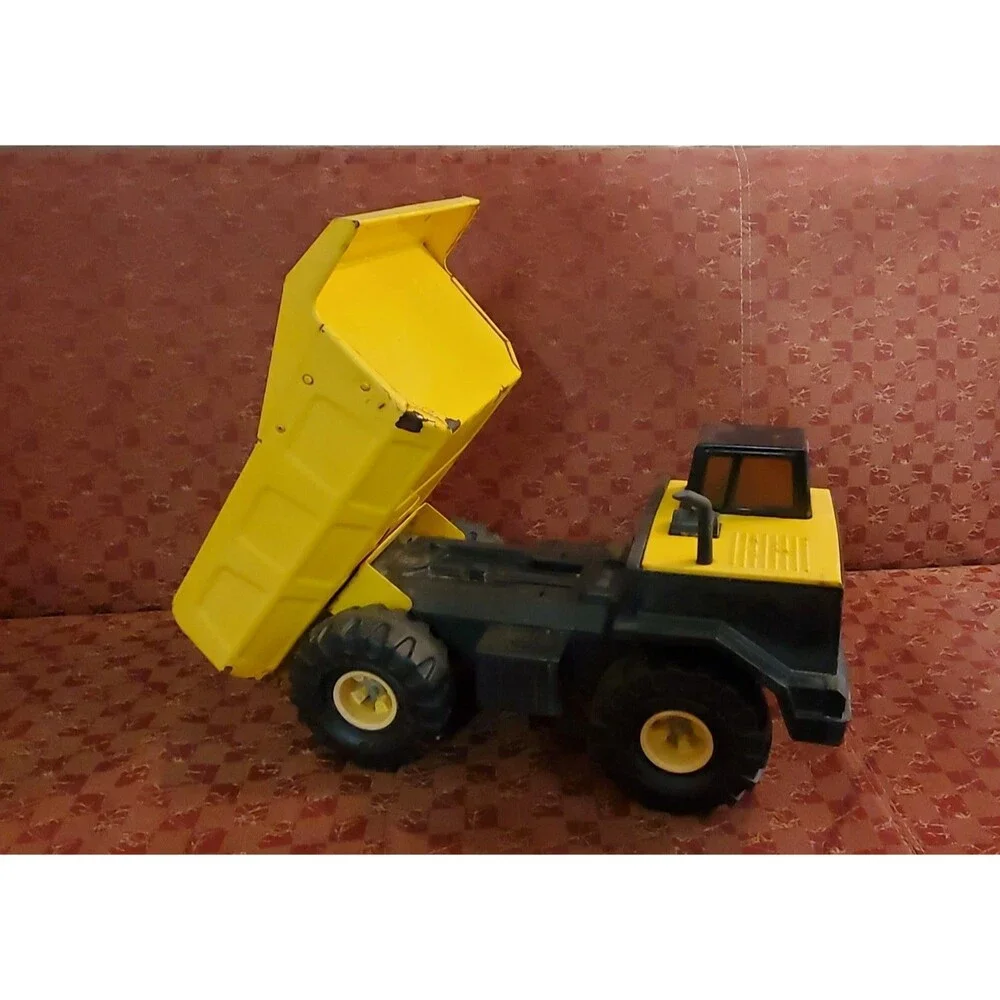 Vintage 1993 Tonka XMB-975 Construction Dump Truck Pressed Steel Yellow Black